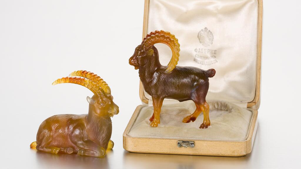 A Fabergé jeweled agate model of a Siberian ibex (right), St. Petersburg, circa 1900-1914 Fabergé agate Siberian ibex